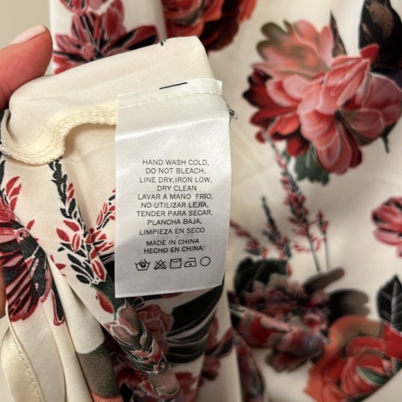 NWOT! Gorgeous silky asymmetrical dress. Has a draped scoop back. - Picture 10 of 11